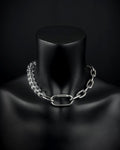 A handmade silver industrial chain necklace with large, chunky, rectangular links. The necklace is made of stainless steel. The necklace is made half-half from thick 4mm chain and 12mm glass transparent beads. The necklace includes a quick link carabiner and a smiley pendant.