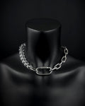 A handmade silver industrial chain necklace with large, chunky, rectangular links. The necklace is made of stainless steel. The necklace is made half-half from thick 4mm chain and 12mm glass transparent beads. The necklace includes a quick link carabiner and a smiley pendant.
