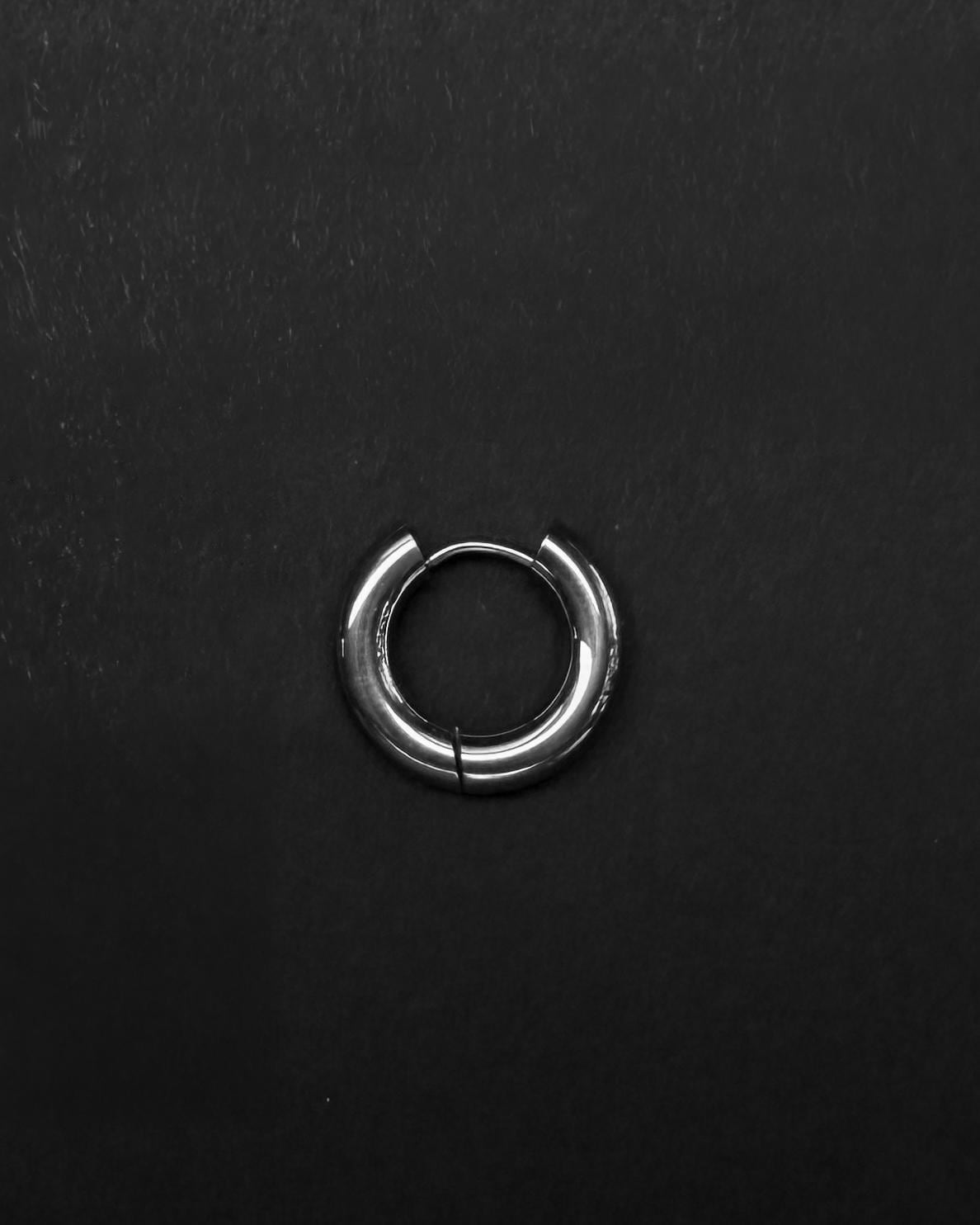 A stainless steel thick big hoop earring