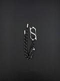 A black paracord keyring featuring a silver-toned stainless steel metal carabiner with an integrated bottle opener. The cord is woven with reflective white threads and finished with two silver metal aglets at the ends and a small circular charm. cyber sigilism style