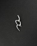 A single silver-toned stainless steel earring featuring an elongated, fluid, and abstract shape with smooth, polished surfaces in the cyber sigilism style. The design consists of two interconnected, curved segments that create an open, organic form with a post backing.
